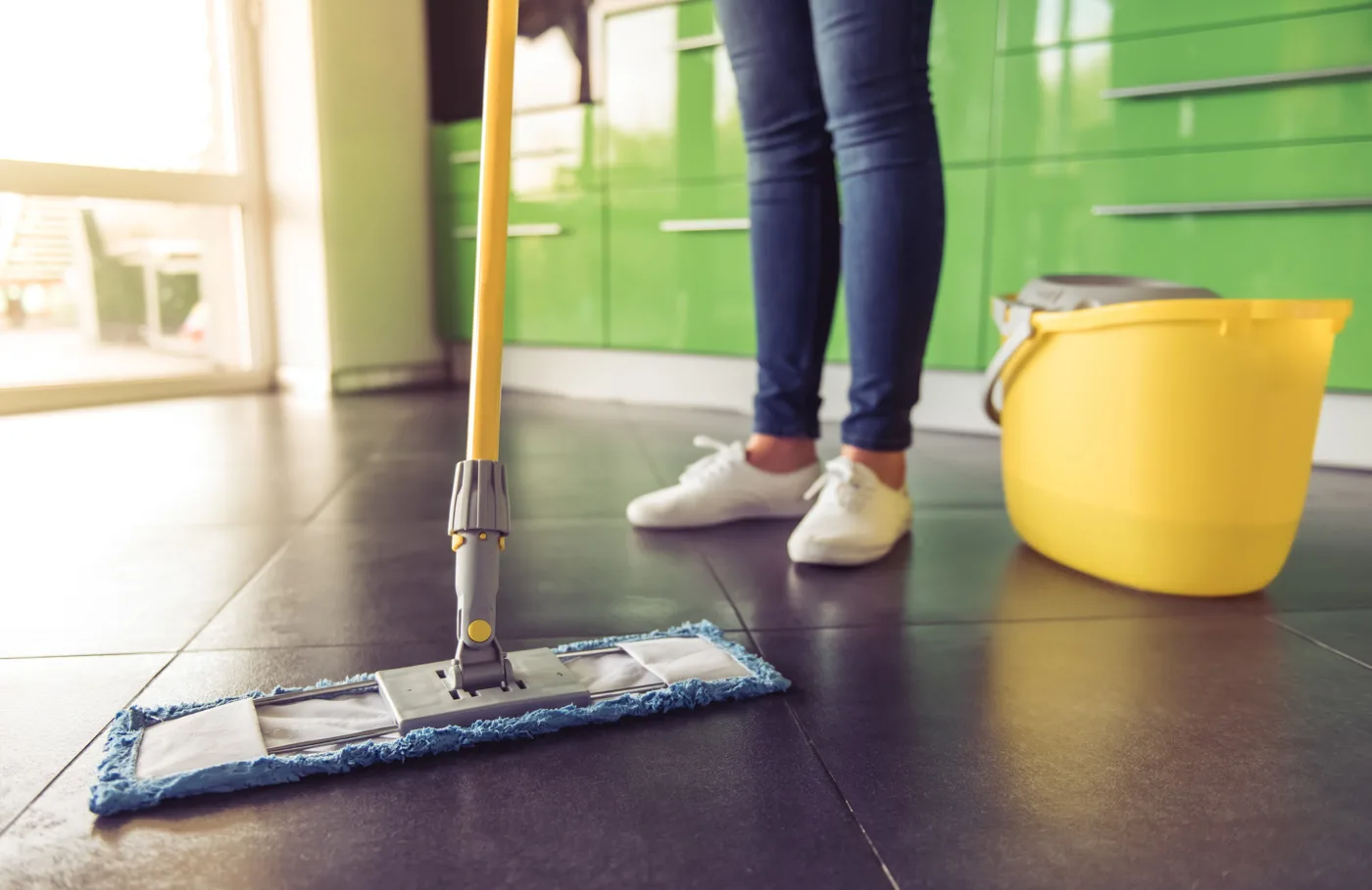 Woman cleaning her kitchen